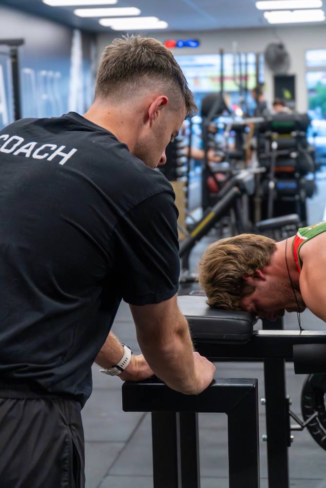 Ultra Fitness coach testing an athlete
