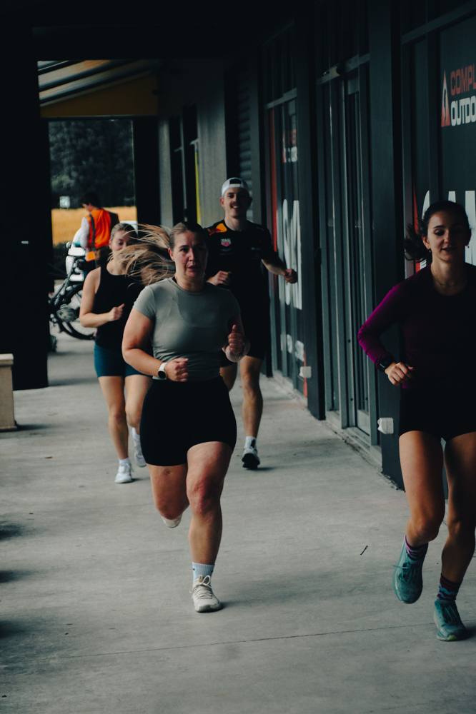 Ultra Fitness members on a group run outside the gym